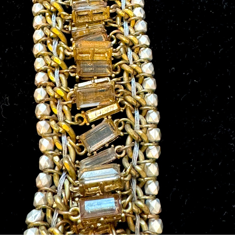 Gold tone and crystal bracelet.